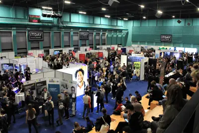 A fair with stands and people in one of DGI Byen’s halls