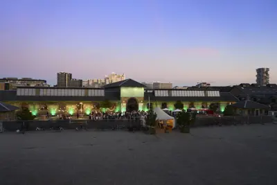 Øksnehallen seen from outside with lighting and celebrations