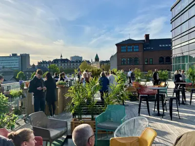 People on the rooftop terrace on a summer day